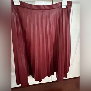 Burgundy J.Crew faux leather pleated skirt.  Size 2
